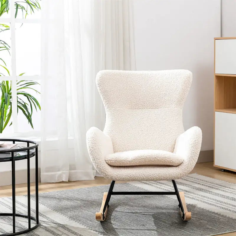 Fauteuil à bascule avec assise rembourrée en velours