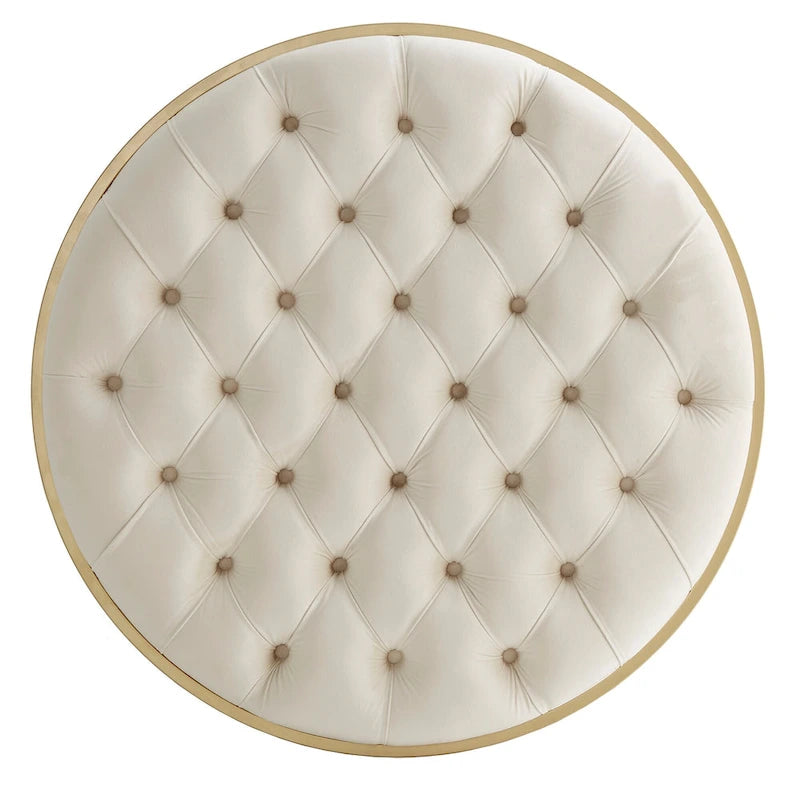 Pouf rond capitonné en velours et finition dorée