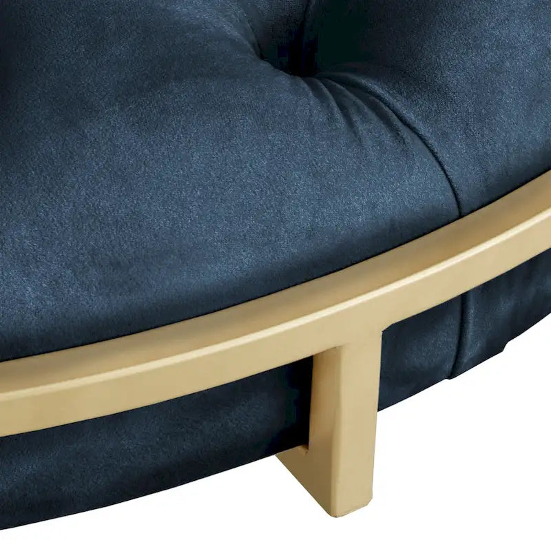 Pouf rond capitonné en velours et finition dorée